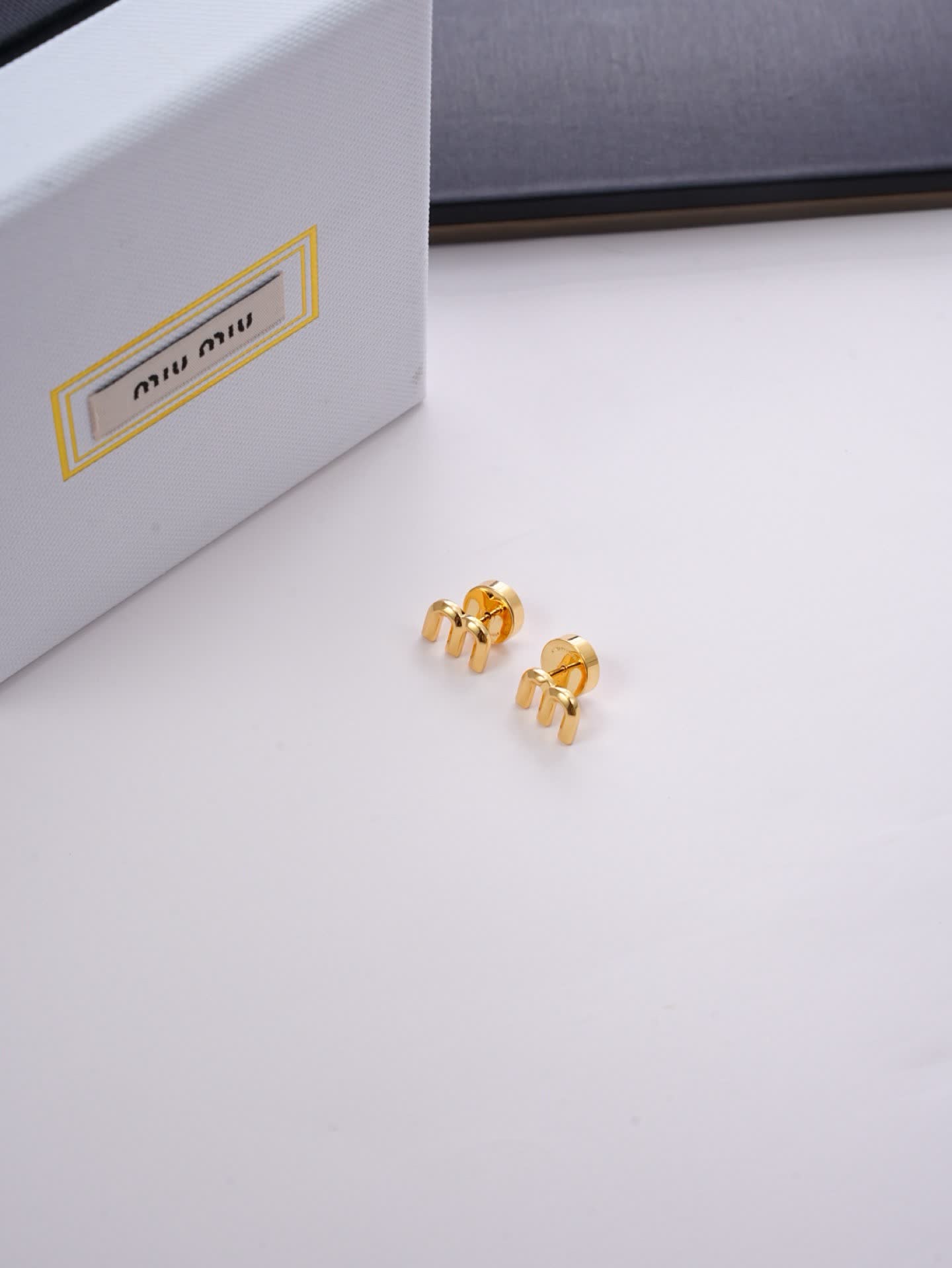 Miu Miu Gold Tone 'M' Stud Earrings
